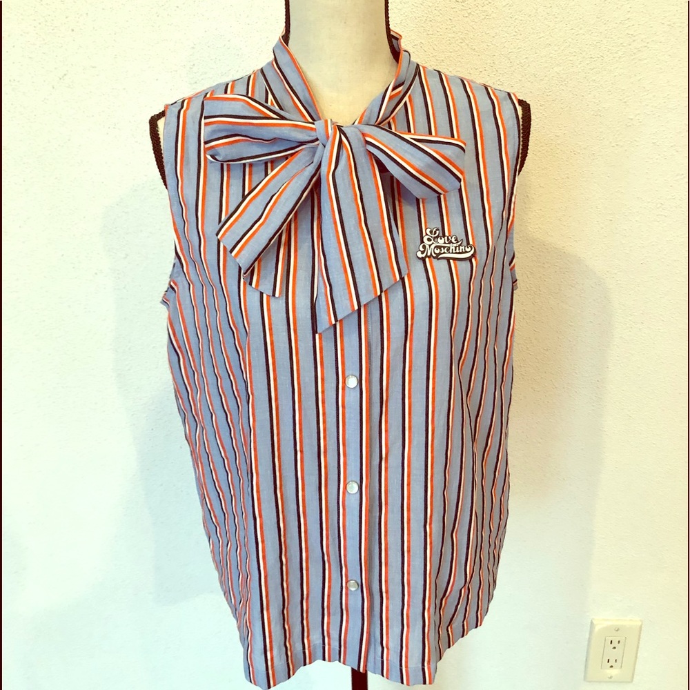 Fabulous Love Moschino sleeveless snap shirt.